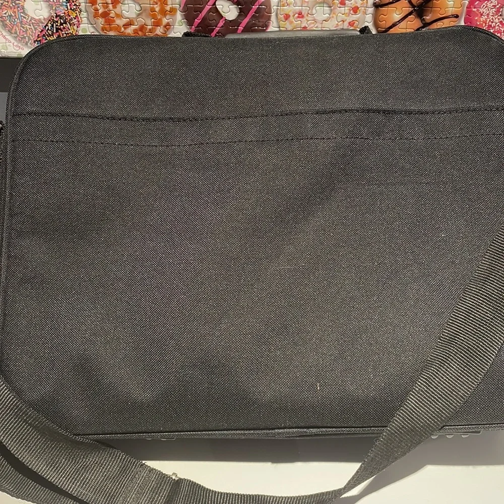 Black canvas init laptop bag. Black. Gently worn.